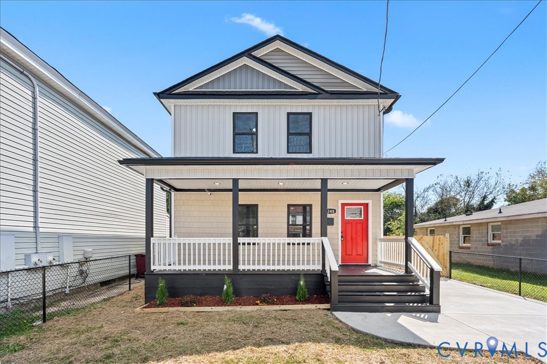 View of front of house featuring covered porch and