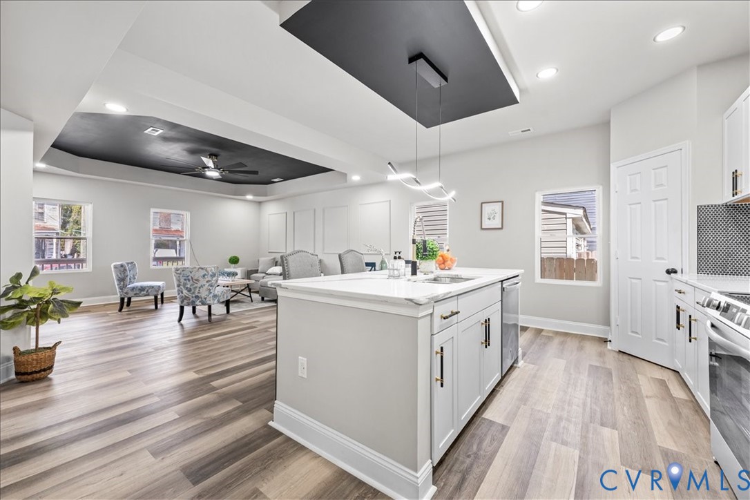 1348 Rome Street Petersburg, VA 23803 - Photo 15 of 45 Kitchen featuring a tray ceiling, white cabinets,