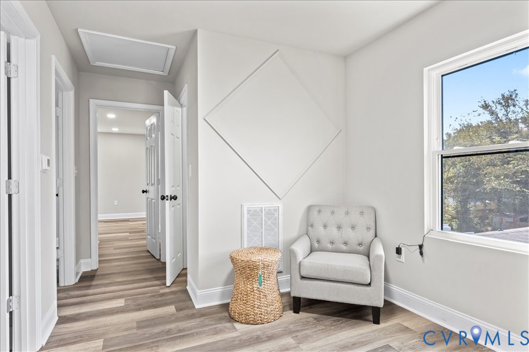 1348 Rome Street Petersburg, VA 23803 - Photo 18 of 45 Living area featuring wood finished floors and att