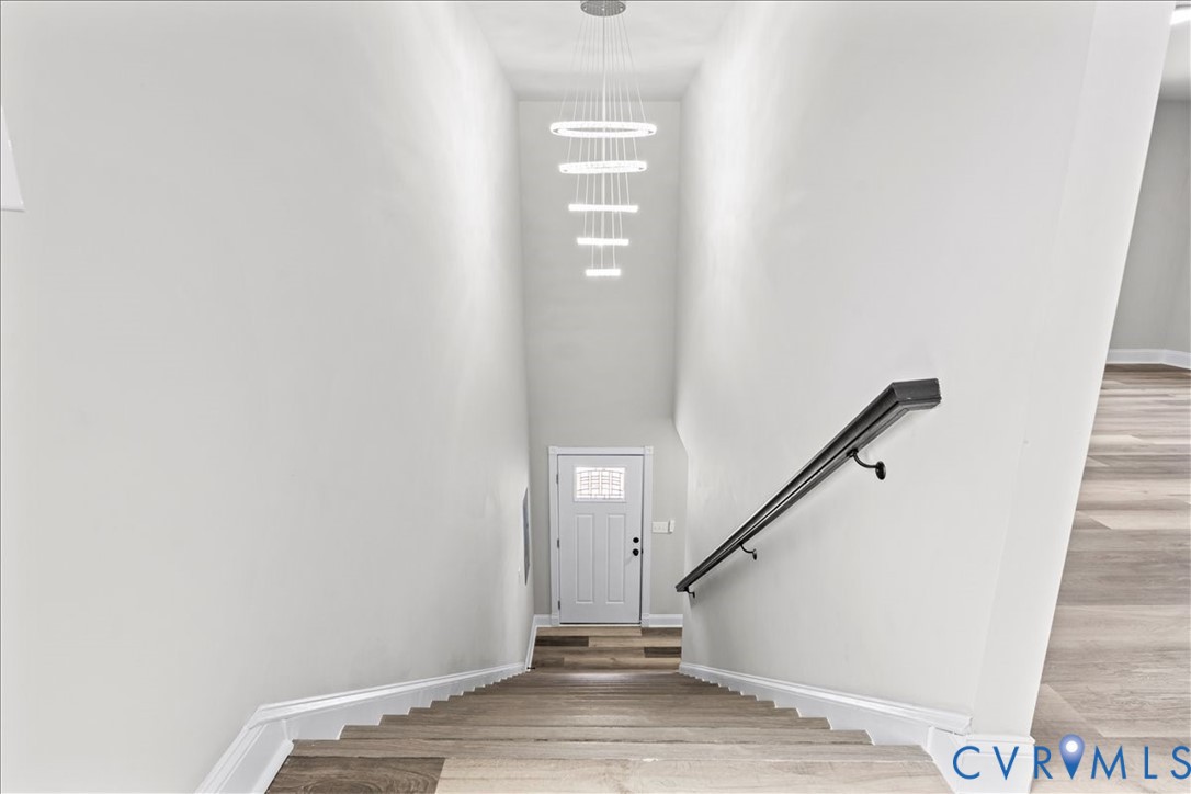 1348 Rome Street Petersburg, VA 23803 - Photo 23 of 45 Stairs with wood finished floors and a high ceilin