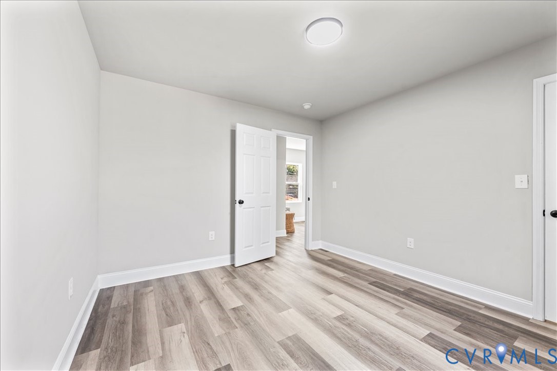 1348 Rome Street Petersburg, VA 23803 - Photo 28 of 45 Unfurnished bedroom featuring light wood-style flo