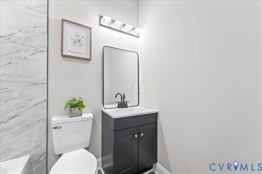 1348 Rome Street Petersburg, VA 23803 - Photo 39 of 45 Bathroom with vanity and a tub