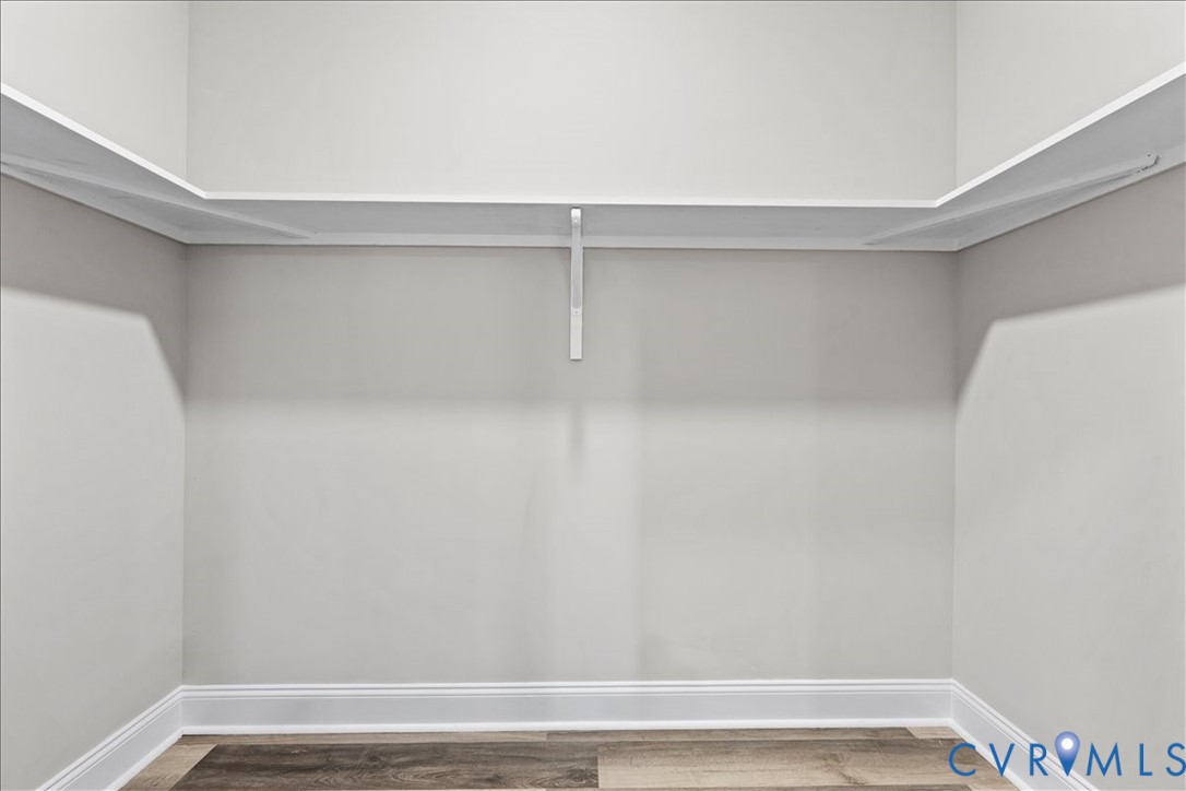 1348 Rome Street Petersburg, VA 23803 - Photo 41 of 45 Walk in closet featuring light wood-type flooring