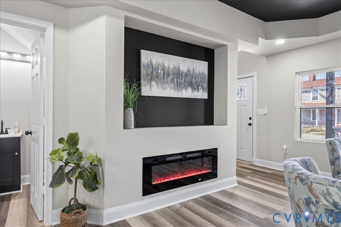 1348 Rome Street Petersburg, VA 23803 - Photo 9 of 45 Living area with light wood finished floors, a gla