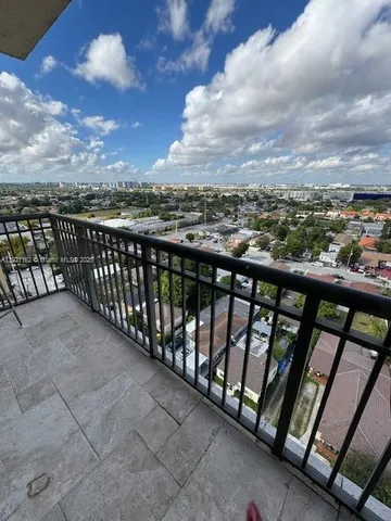a view of city from a balcony