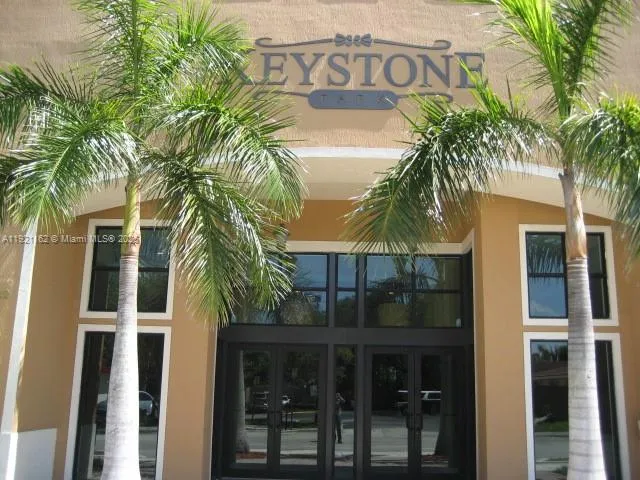 a tall building sitting next to a street