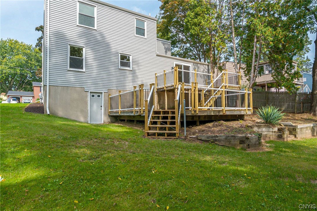 2268 Connell Terrace Lysander, NY 13027 - Photo 19 of 42 NEW TWO-TIERED BACK DECK HAS VINYL RAIL AND METAL