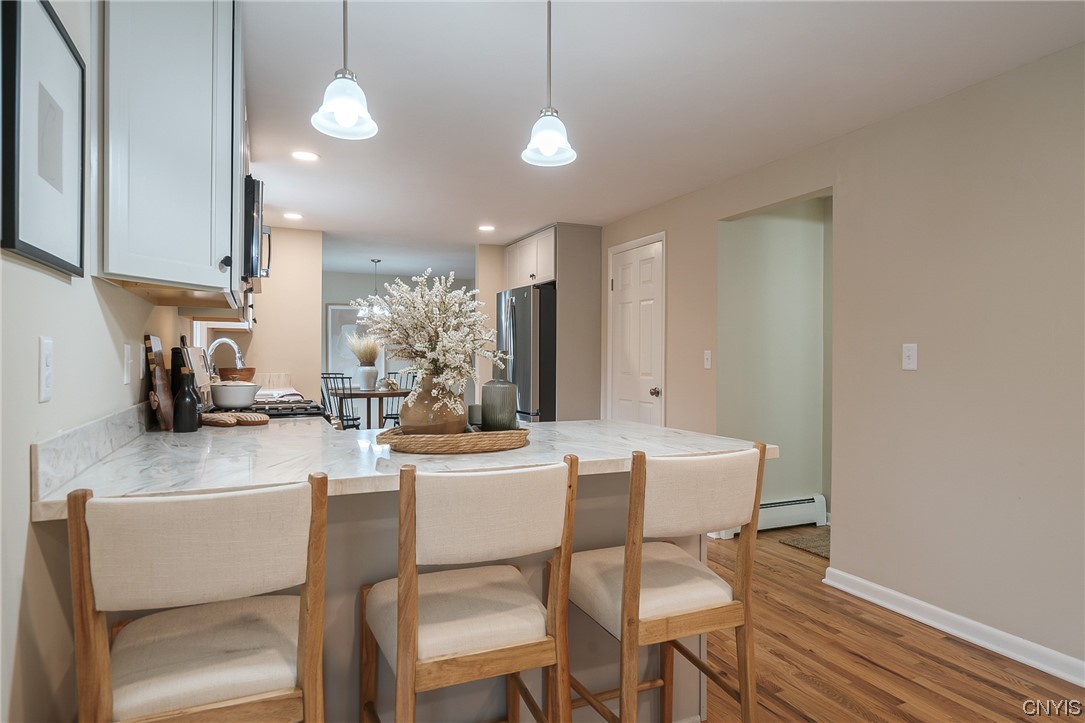 2268 Connell Terrace Lysander, NY 13027 - Photo 22 of 42 KITCHEN BREAKFAST BAR..