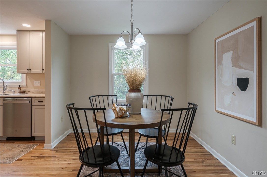 2268 Connell Terrace Lysander, NY 13027 - Photo 31 of 42 FORMAL DINING ROOM WITH BEAUTIFUL HARDWOOD FLOORS.