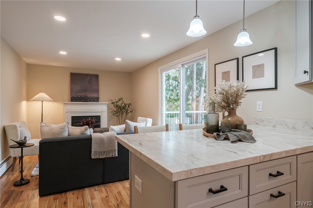 2268 Connell Terrace Lysander, NY 13027 - Photo 7 of 42 FAMILY ROOM WITH NEW GAS FIREPLACE! NEW WINDOWS