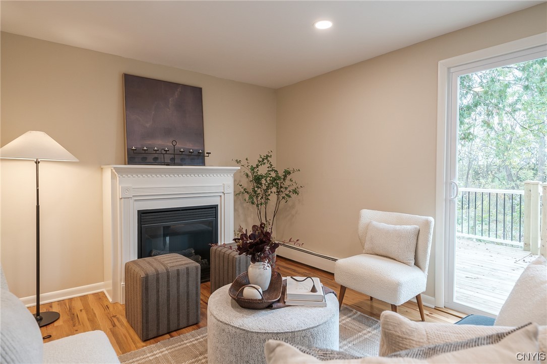 2268 Connell Terrace Lysander, NY 13027 - Photo 8 of 42 FAMILY ROOM IS LIGHT AND BRIGHT! COZY IN THE WINT