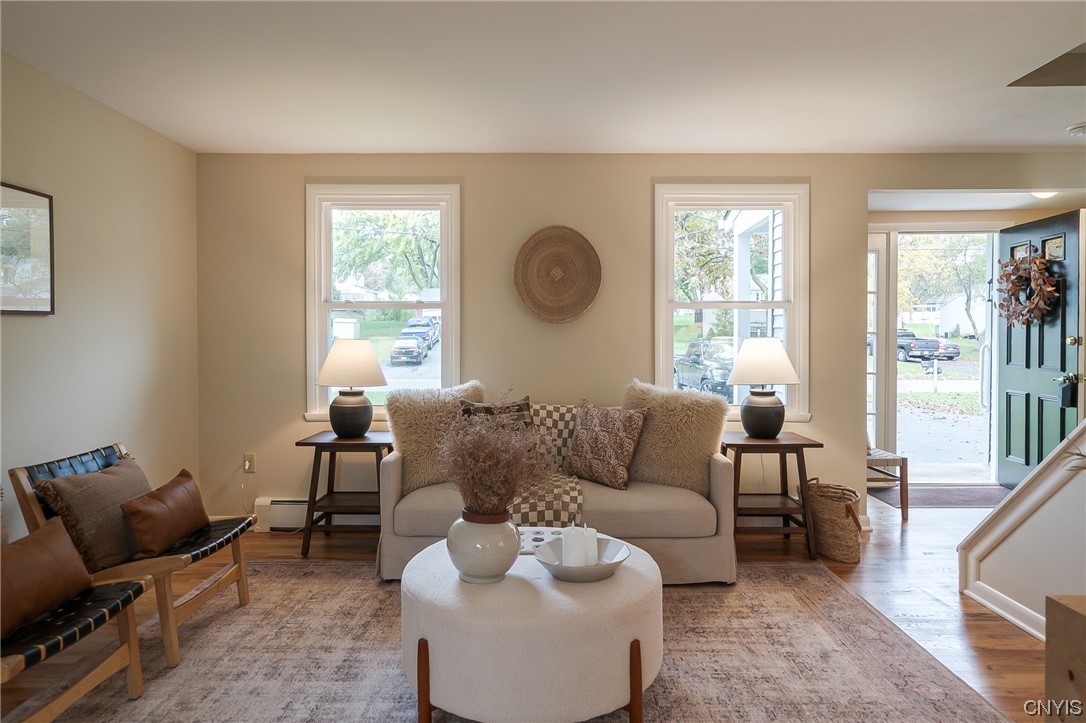2268 Connell Terrace Lysander, NY 13027 - Photo 9 of 42 FRONT FAMILY ROOM ~ OPEN, LIGHT AND BRIGHT!