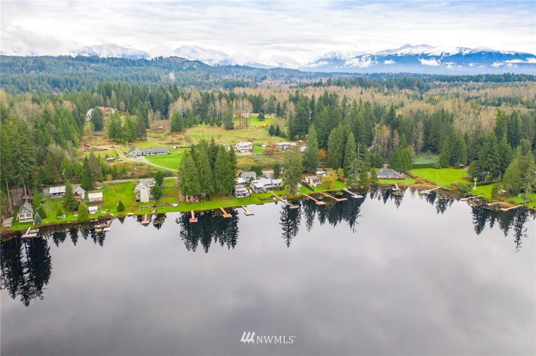 8716 East Lake Cochran Road Monroe, WA 98272 - Photo 25 of 29 a view of a lake with a mountain in the back