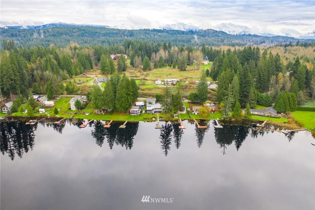 8716 East Lake Cochran Road Monroe, WA 98272 - Photo 26 of 29 a view of a lake with a mountain in the back