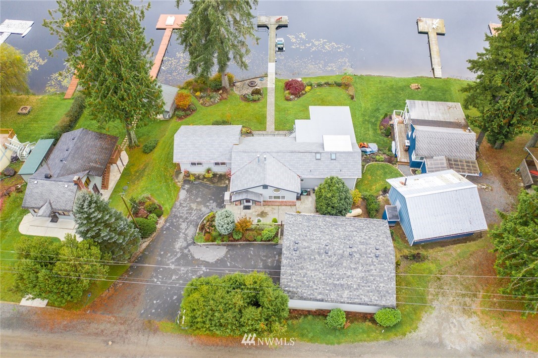 8716 East Lake Cochran Road Monroe, WA 98272 - Photo 29 of 29 an aerial view of a house with garden space and a street view