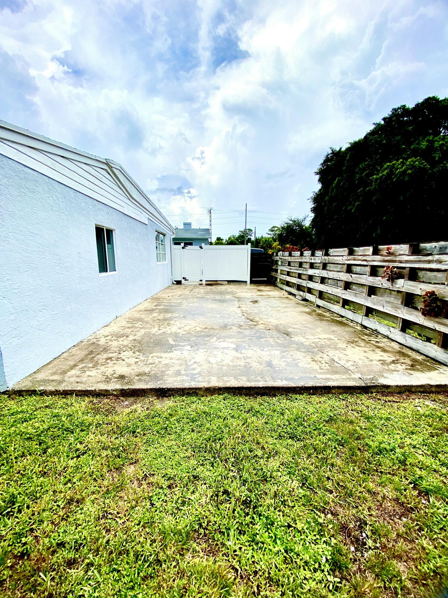 4344 Mars Avenue West Palm Beach, FL 33406 - Photo 11 of 11 a view of a backyard