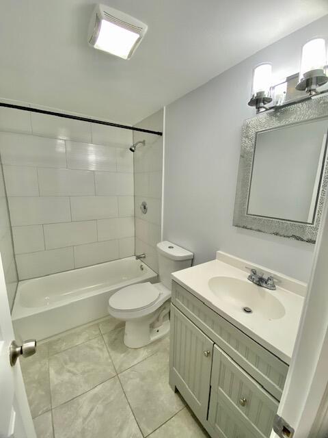 4344 Mars Avenue West Palm Beach, FL 33406 - Photo 7 of 11 a bathroom with a sink a toilet and shower