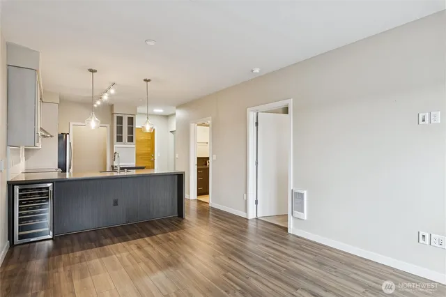 a view of kitchen with wooden floor