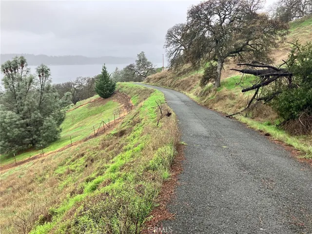a view of a road with a yard
