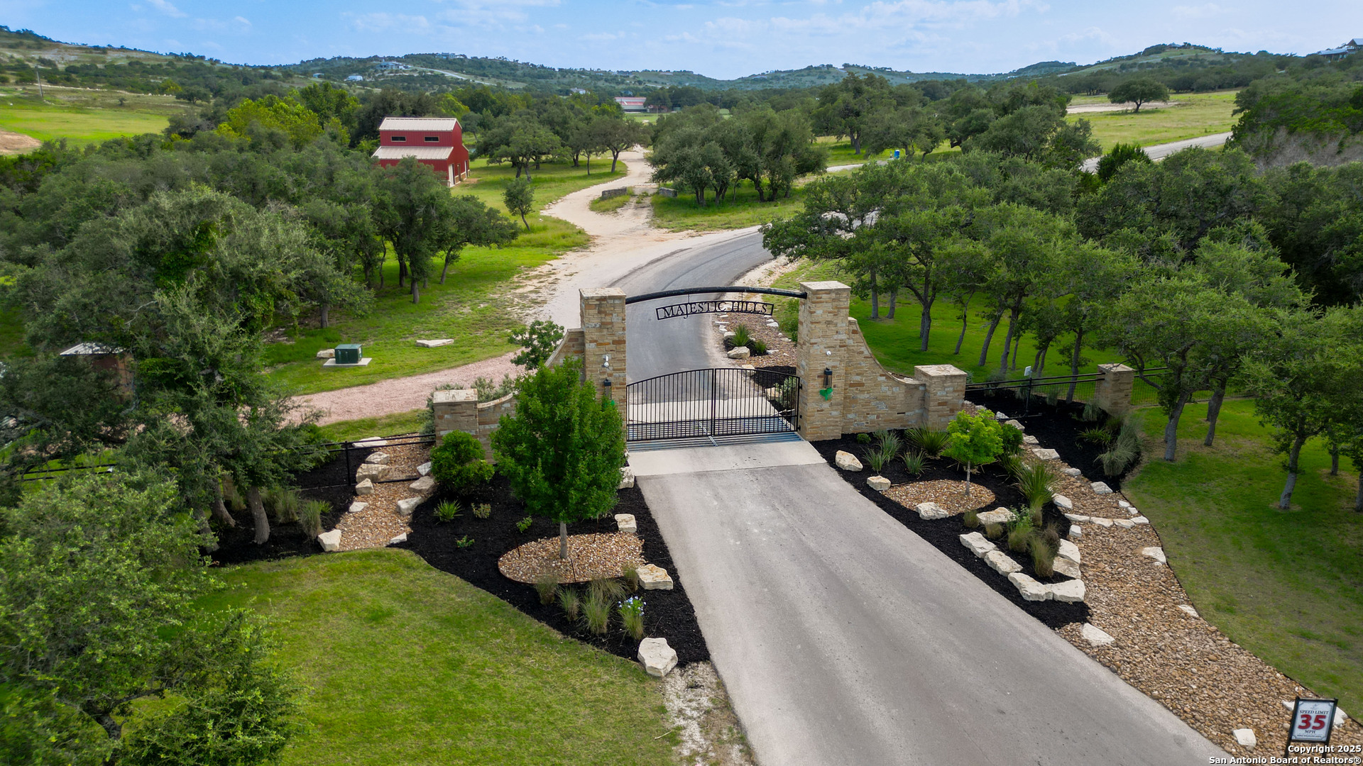 340 West Starview Cove Blanco, TX 78606 - Photo 2 of 25 an aerial view of a house with garden space and street view