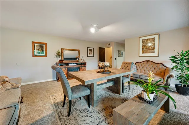 a bathroom with a sink toilet a mirror and shower