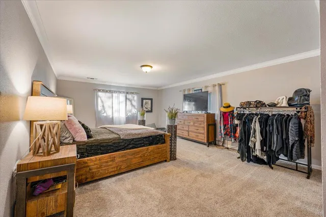 a view of a chairs and a tables in the balcony