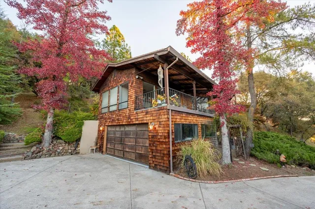 a view of balcony with wooden floor