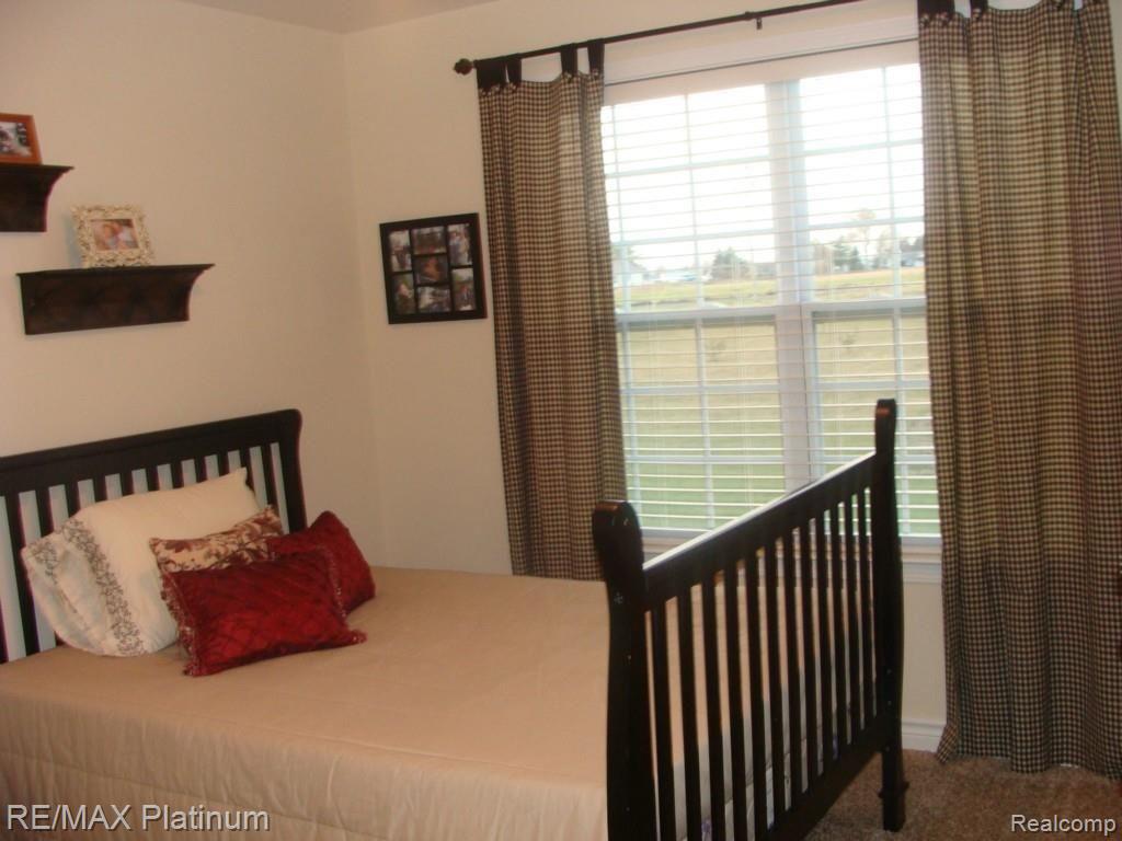 4720 Hogback Road Fowlerville, MI 48836 - Photo 12 of 18 Second bedroom