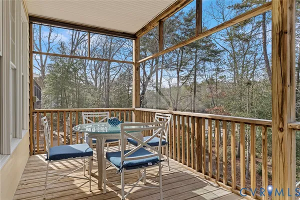 a kitchen with stainless steel appliances granite countertop a sink a refrigerator and cabinets
