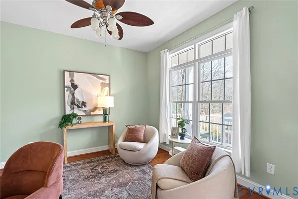 a spacious bedroom with a bed a window and closet