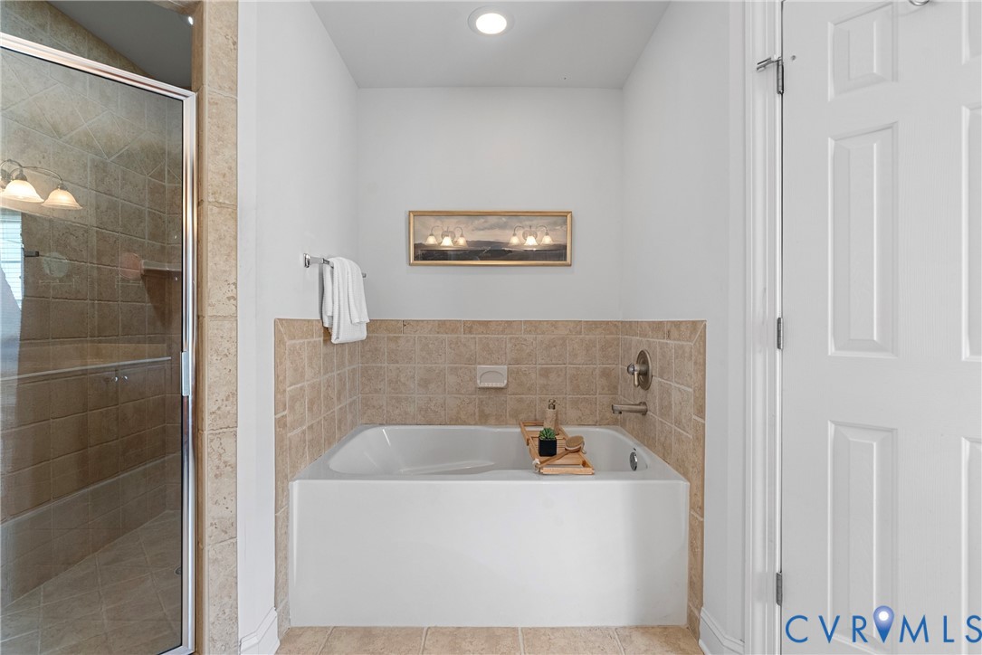 170 Rappa Run Road Topping, VA 23169 - Photo 28 of 60 a bathroom with shower and a bathtub