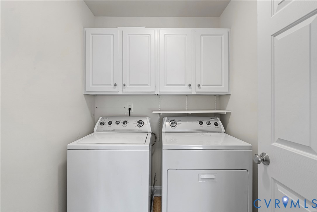 170 Rappa Run Road Topping, VA 23169 - Photo 38 of 60 a view of storage and utility room with washer and dryer