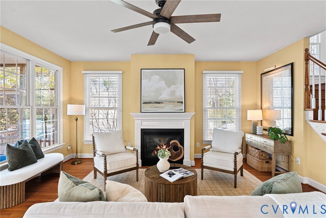170 Rappa Run Road Topping, VA 23169 - Photo 39 of 60 a living room with furniture fireplace and a large window