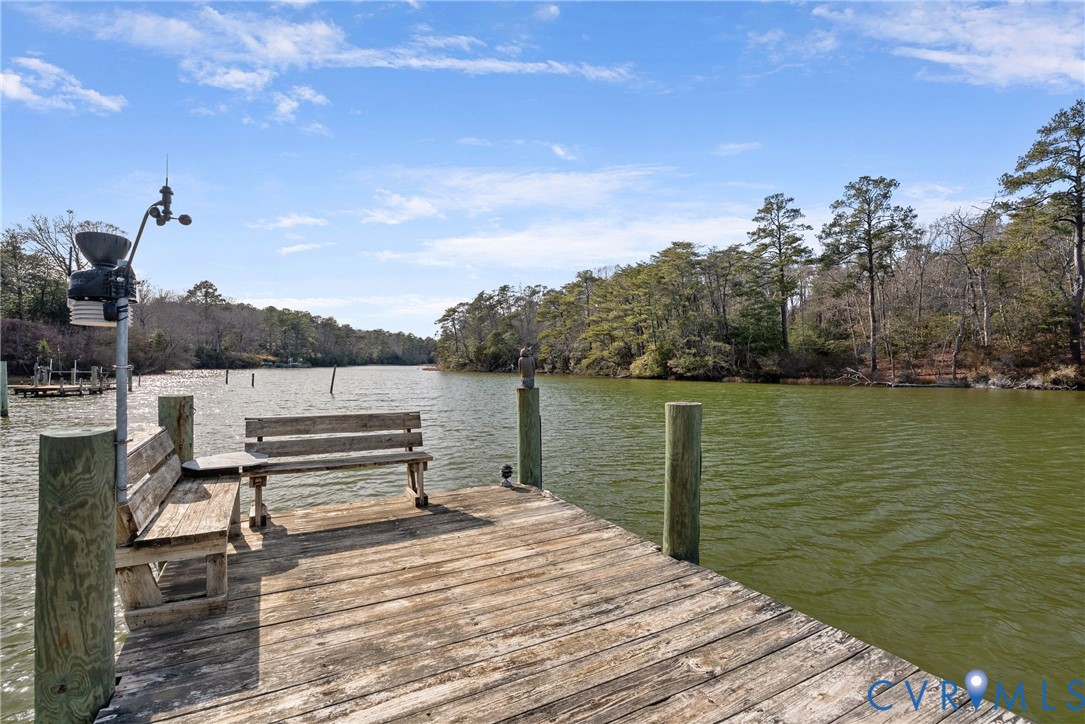 170 Rappa Run Road Topping, VA 23169 - Photo 53 of 60 a view of a lake with chairs