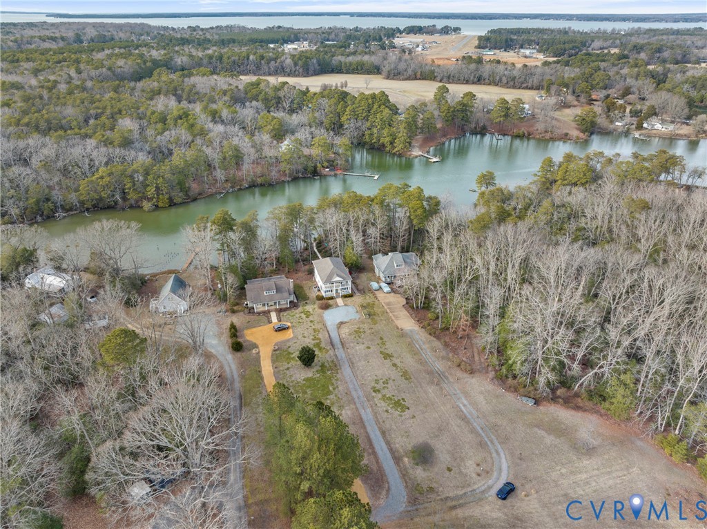 170 Rappa Run Road Topping, VA 23169 - Photo 57 of 60 an aerial view of residential house with outdoor space and lake view