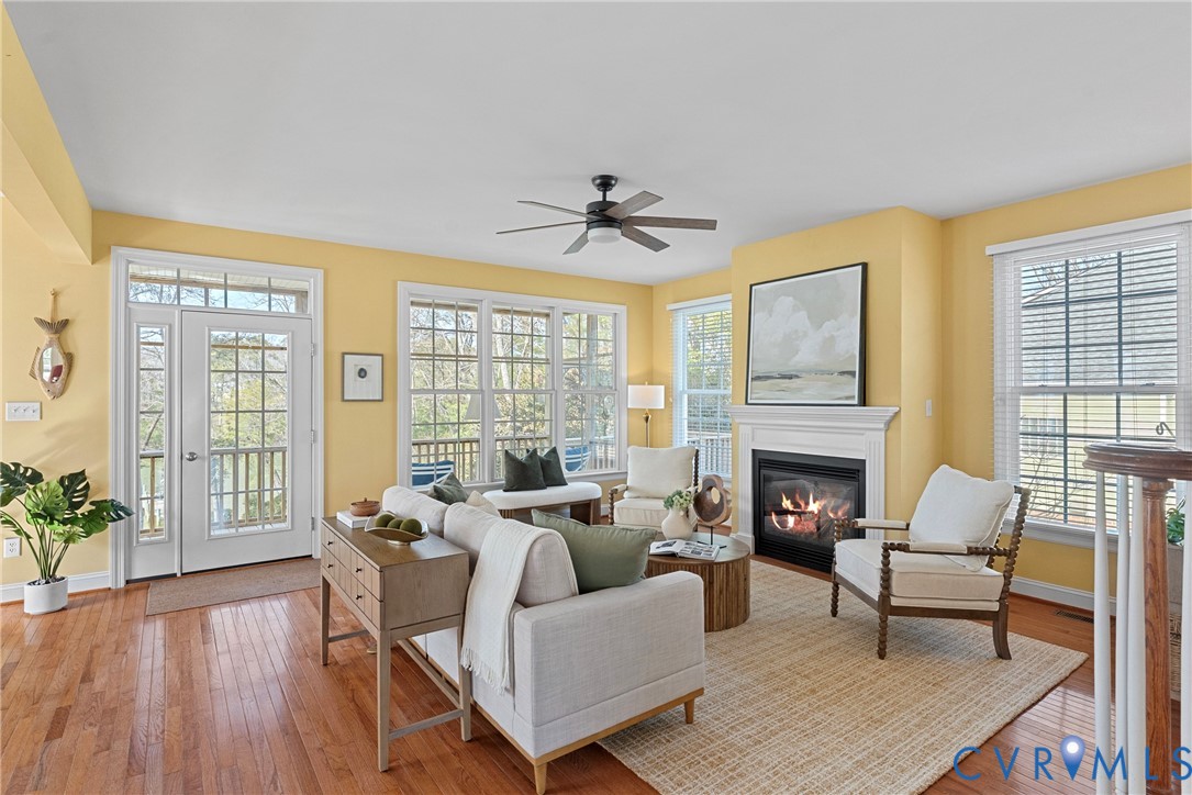 170 Rappa Run Road Topping, VA 23169 - Photo 7 of 60 a living room with furniture and a fireplace