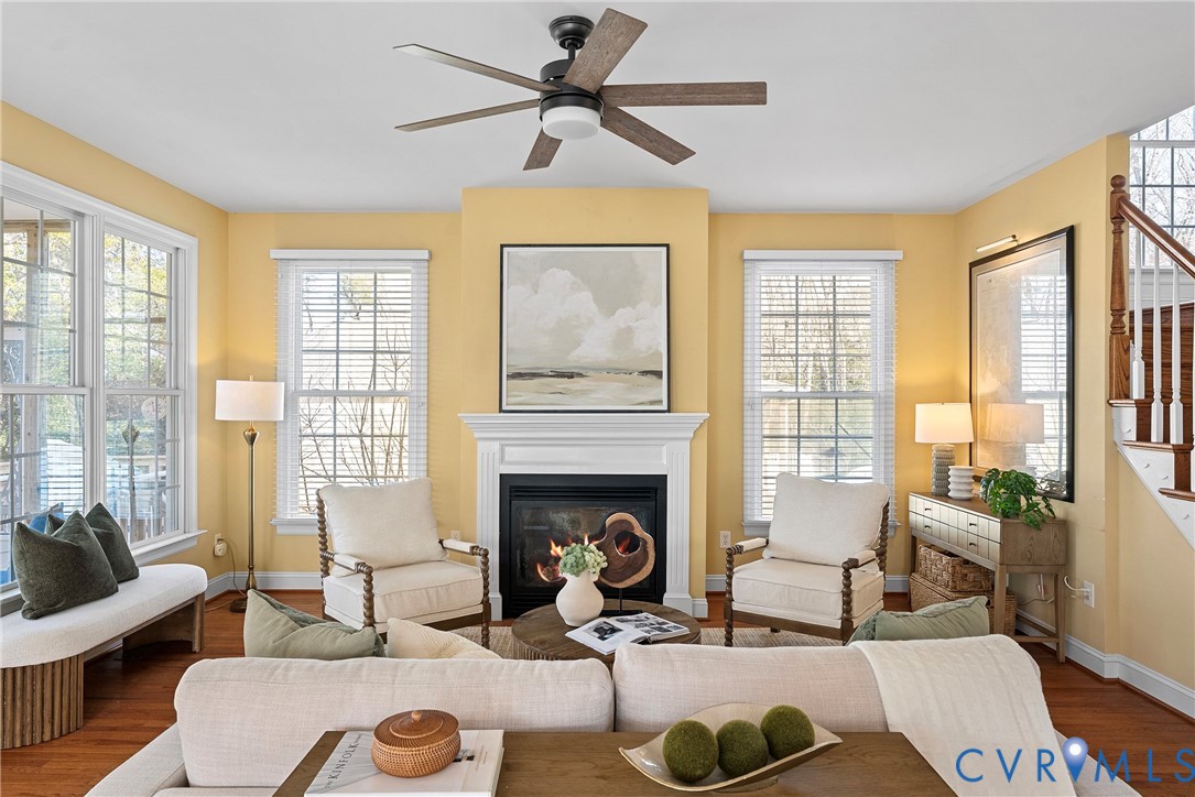 170 Rappa Run Road Topping, VA 23169 - Photo 8 of 60 a living room with furniture fireplace and a large window
