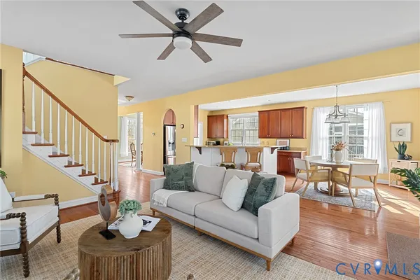 a dining room with furniture window wooden floor