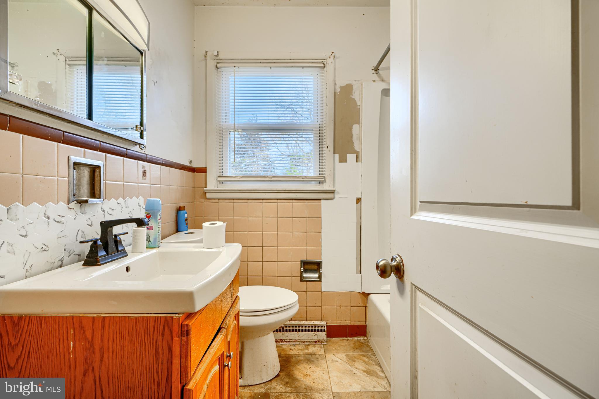 513 Round Top Road Chestertown, MD 21620 - Photo 11 of 18 a bathroom with a sink toilet and shower