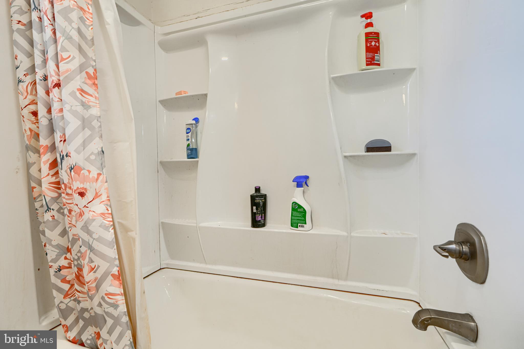 513 Round Top Road Chestertown, MD 21620 - Photo 13 of 18 a bathroom with a bathtub and a shower