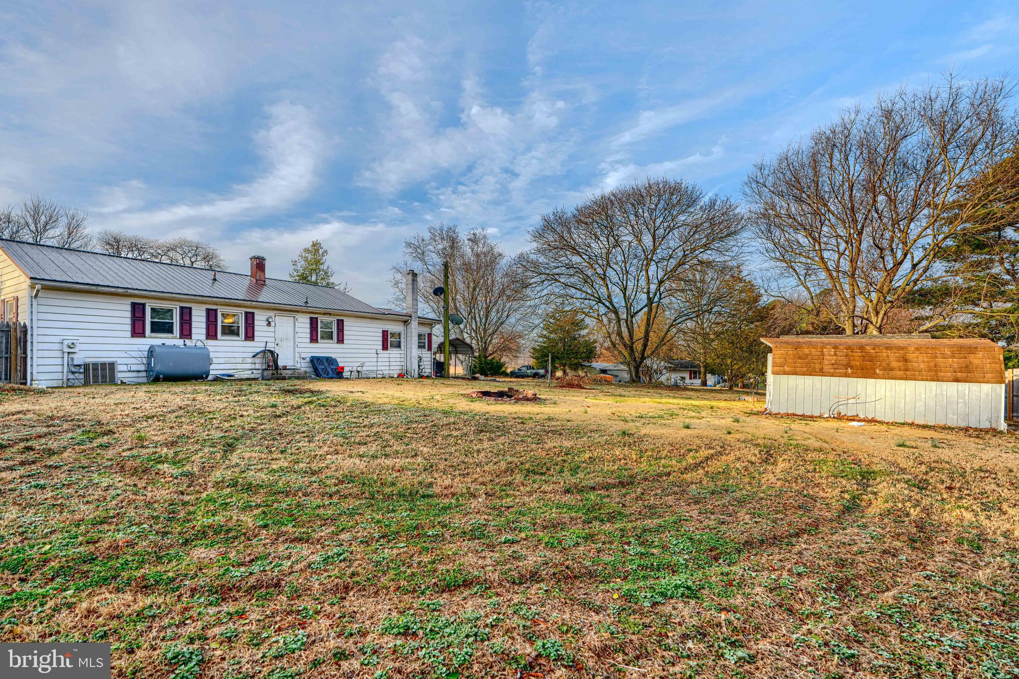 513 Round Top Road Chestertown, MD 21620 - Photo 18 of 18 a front view of house with yard and trees in the background