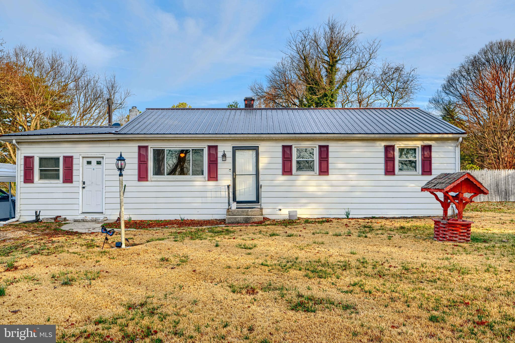 513 Round Top Road Chestertown, MD 21620 - Photo 2 of 18 a front view of a house with a yard