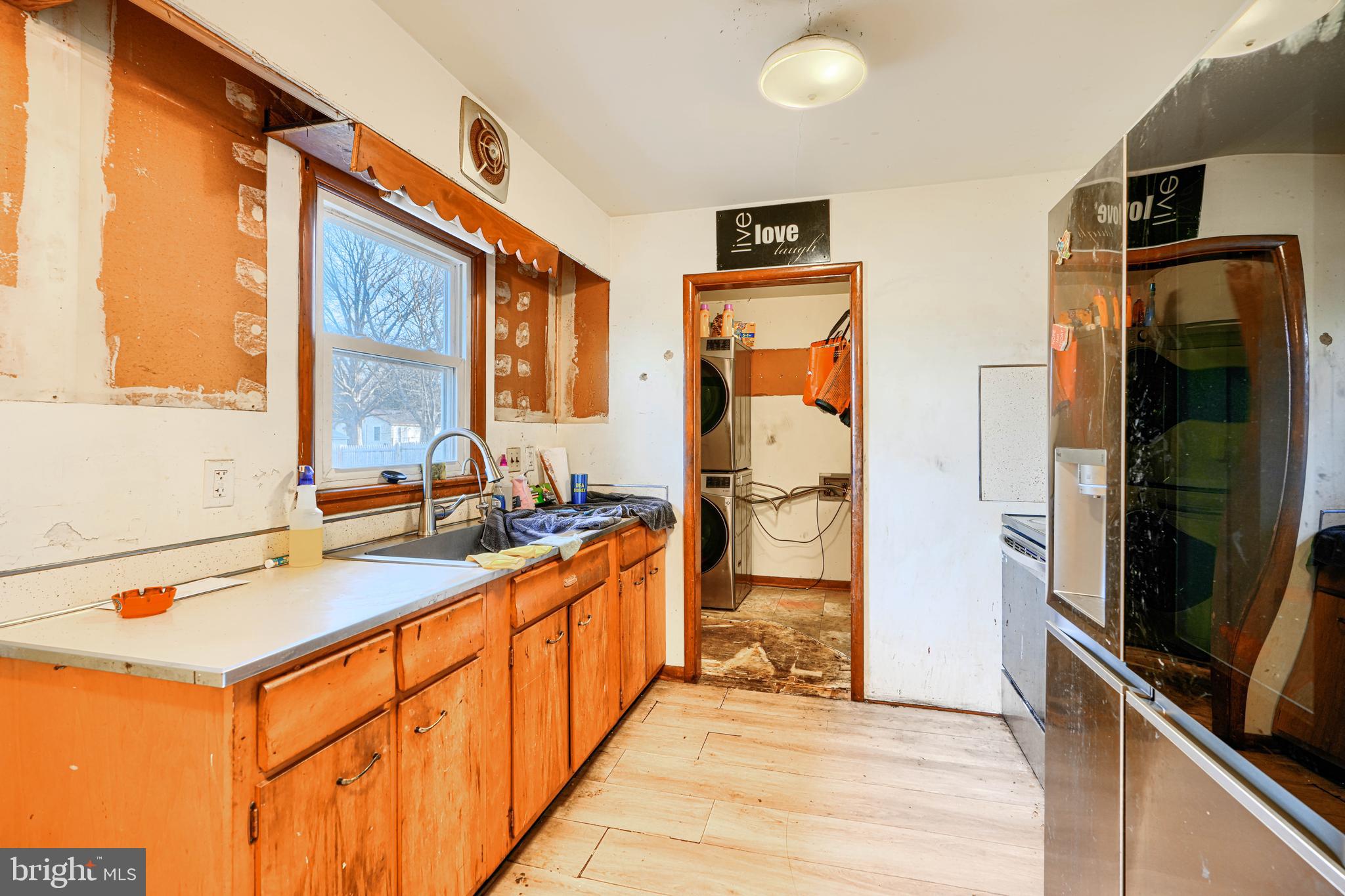 513 Round Top Road Chestertown, MD 21620 - Photo 5 of 18 a kitchen with stainless steel appliances granite countertop a refrigerator and a sink