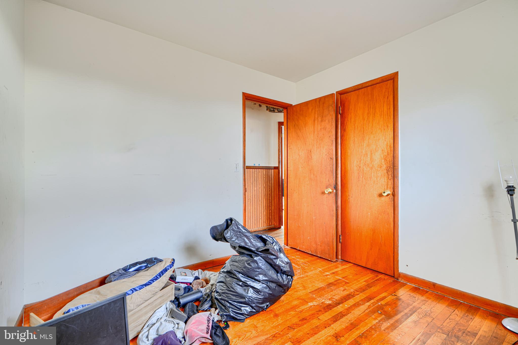 513 Round Top Road Chestertown, MD 21620 - Photo 8 of 18 a bed room with a bed and a window
