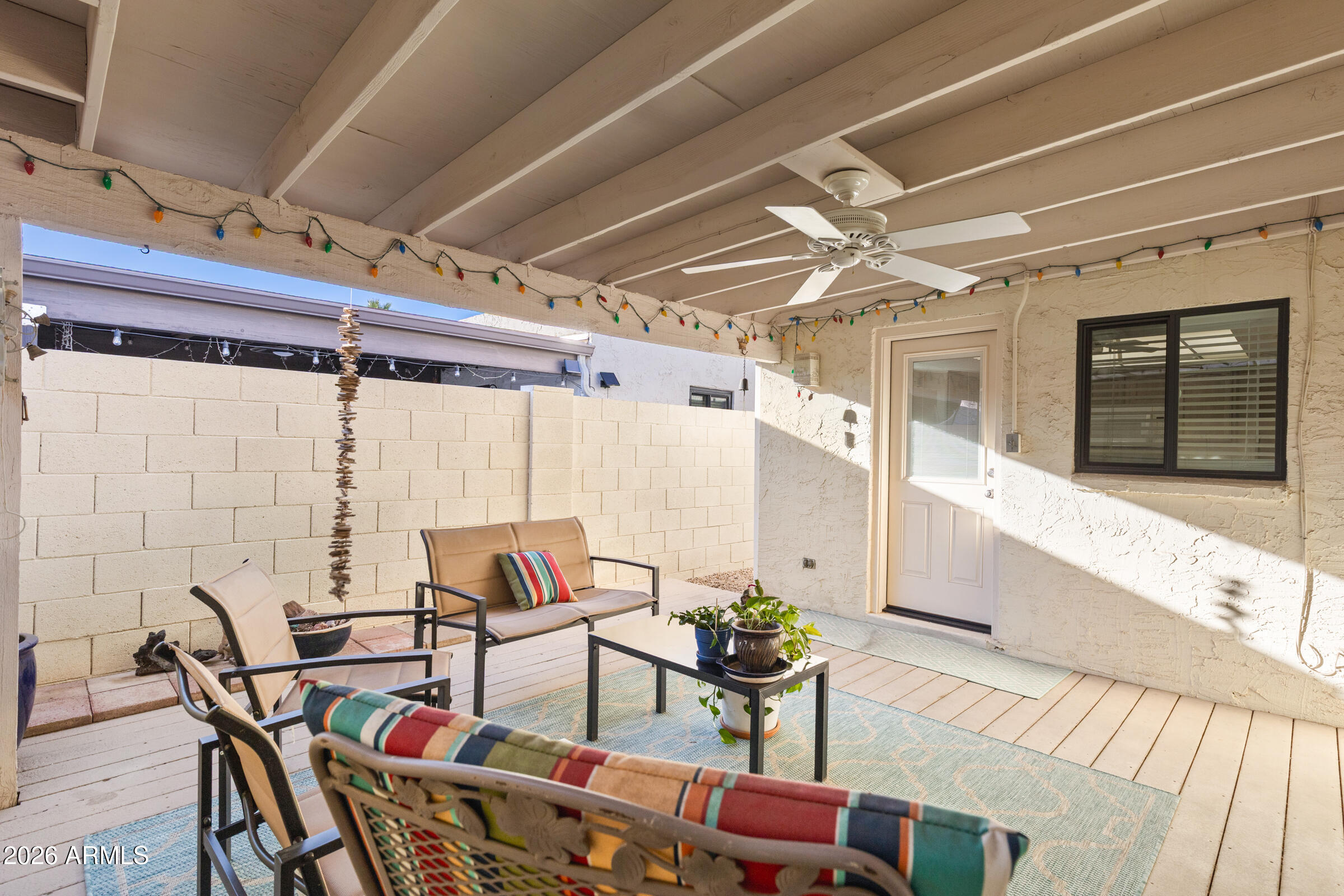 6512 North 12th Way Phoenix, AZ 85014 - Photo 26 of 39 a building outdoor space with patio furniture and potted plants