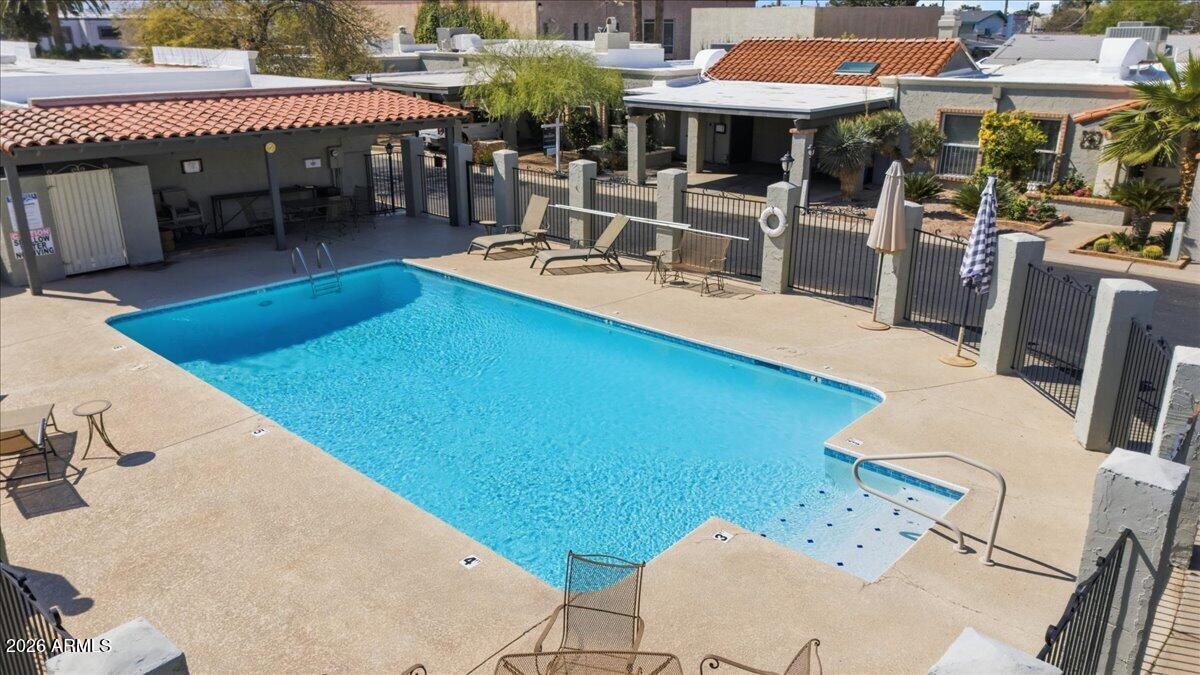 6512 North 12th Way Phoenix, AZ 85014 - Photo 29 of 39 a patio with a table and chairs