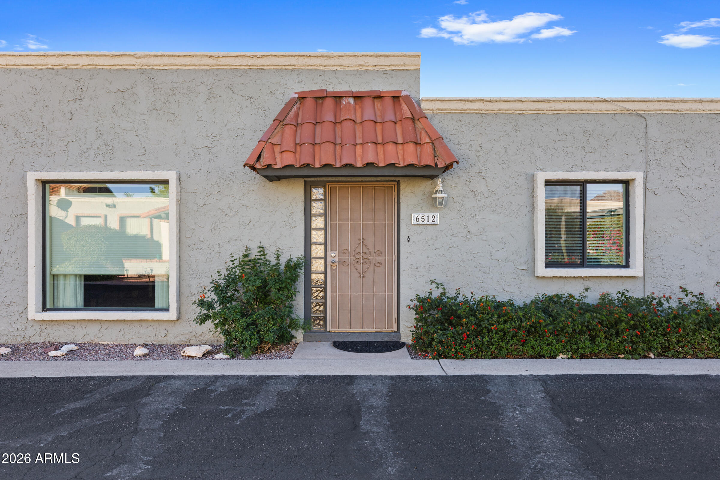 6512 North 12th Way Phoenix, AZ 85014 - Photo 32 of 39 a front view of a house with entryway