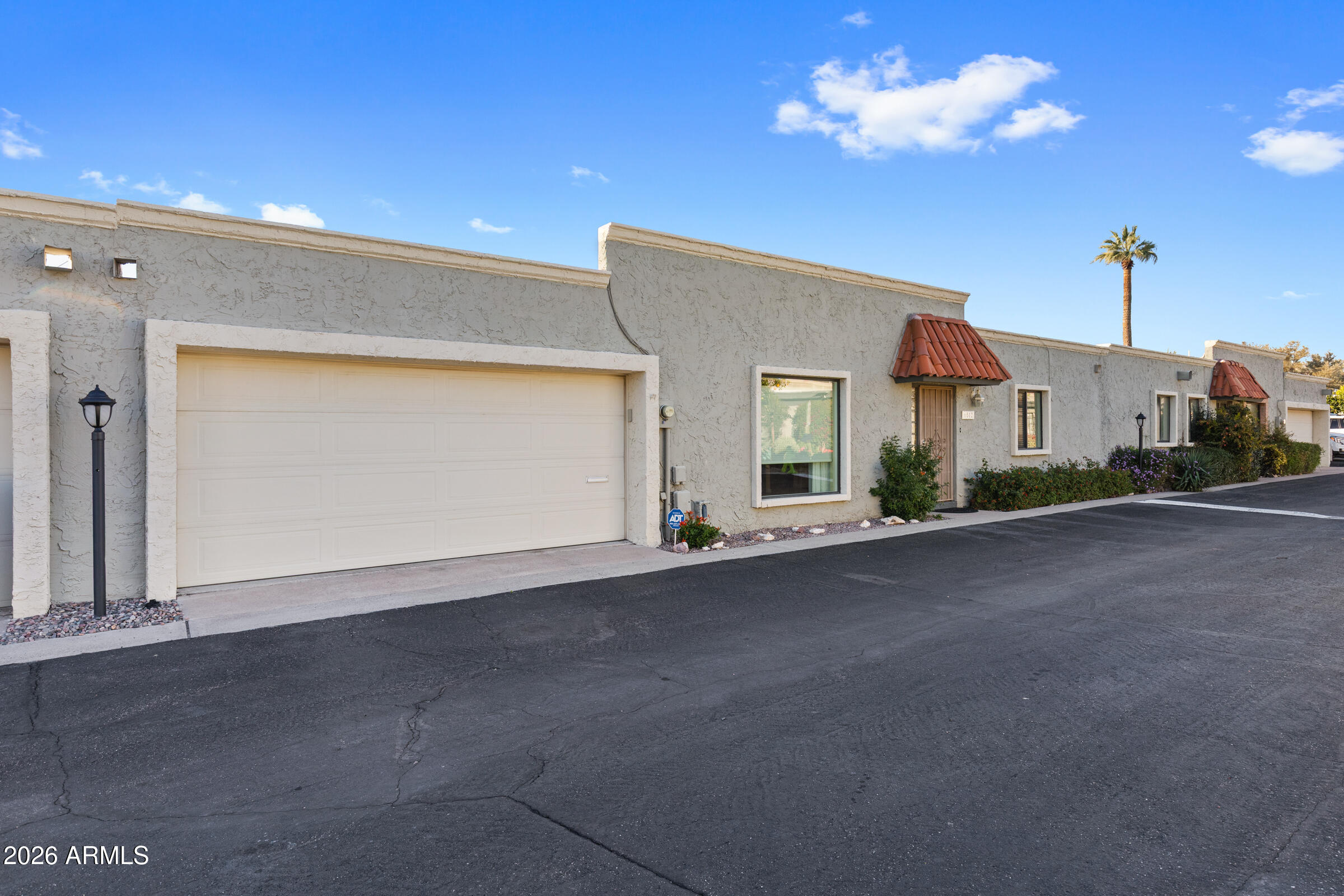 6512 North 12th Way Phoenix, AZ 85014 - Photo 33 of 39 a view of a house with a garage