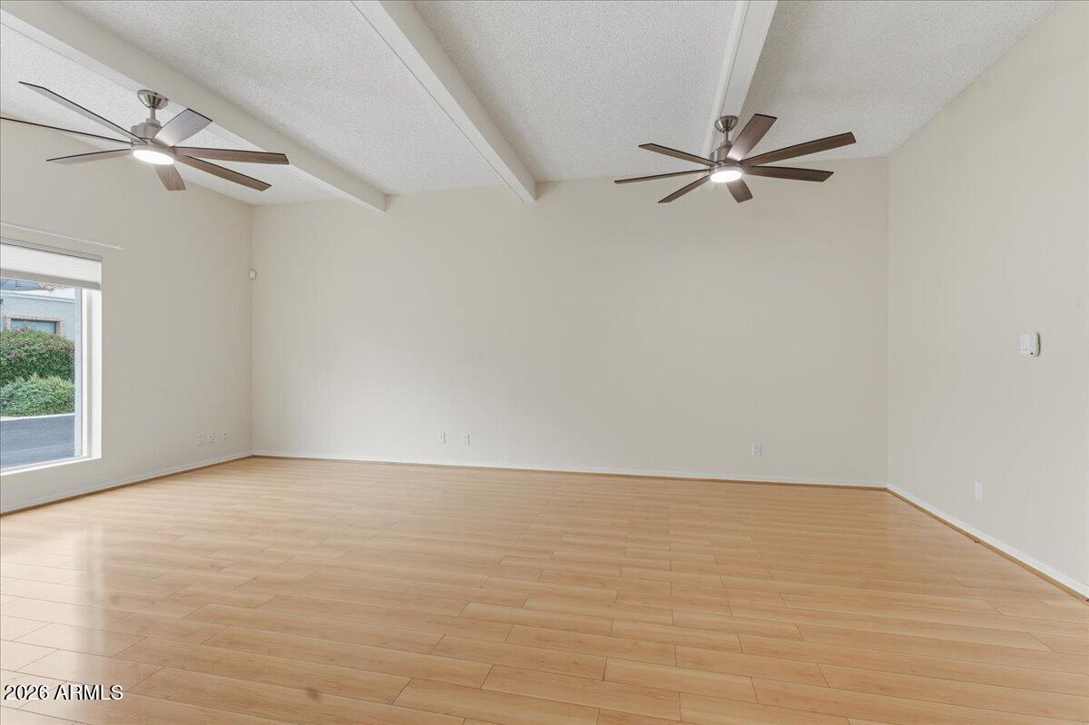 6512 North 12th Way Phoenix, AZ 85014 - Photo 7 of 39 a view of an empty room with a window