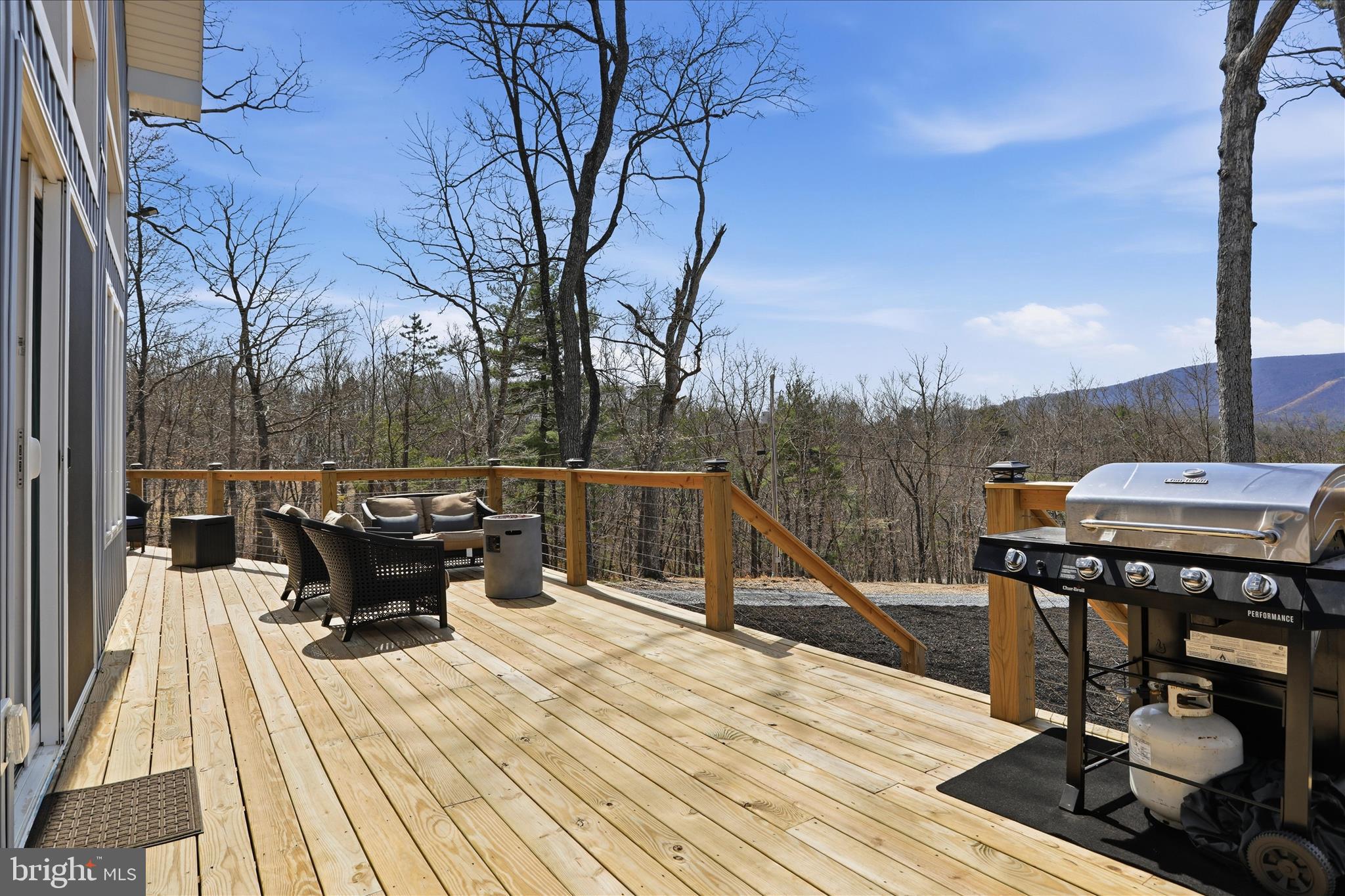 432 Lost Point Lane Berkeley Springs, WV 25411 - Photo 27 of 38 Deck with lighted posts.